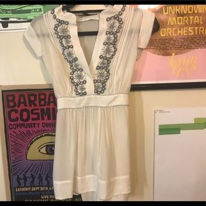 BCBG white silky blouse.